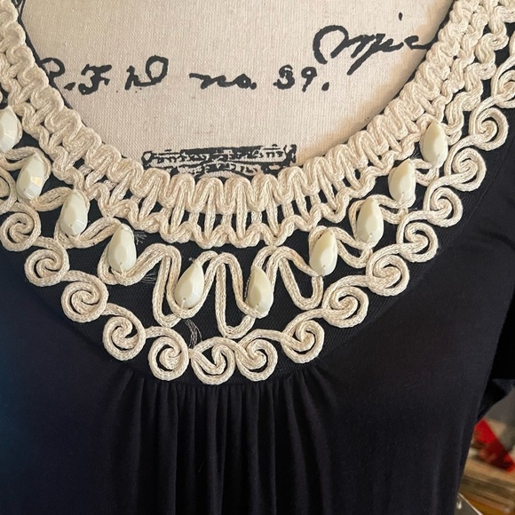 Lovely Black Dress with crochet neckline & Ruffled hem. Simple and Chic! - Picture 5 of 12